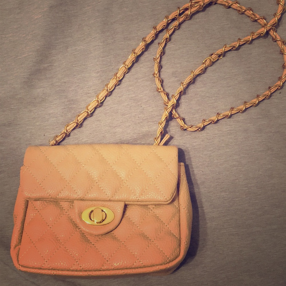 Camel tone cross body bag with gold accents